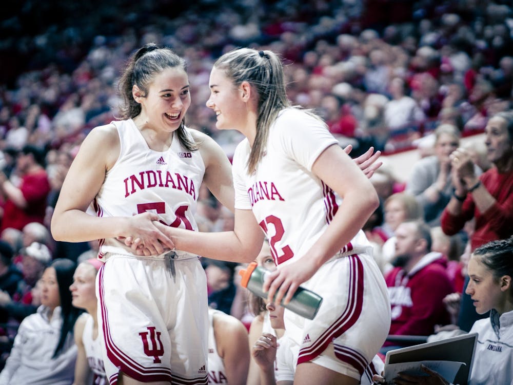 Senior forward MacKenzie Holmes celebrates with freshman forward Lilly Meister Jan. 15, 2023 at Simon Skjodt Assembly Hall in Bloomington, Indiana. The Hoosiers face Ohio State on Thursday night.
