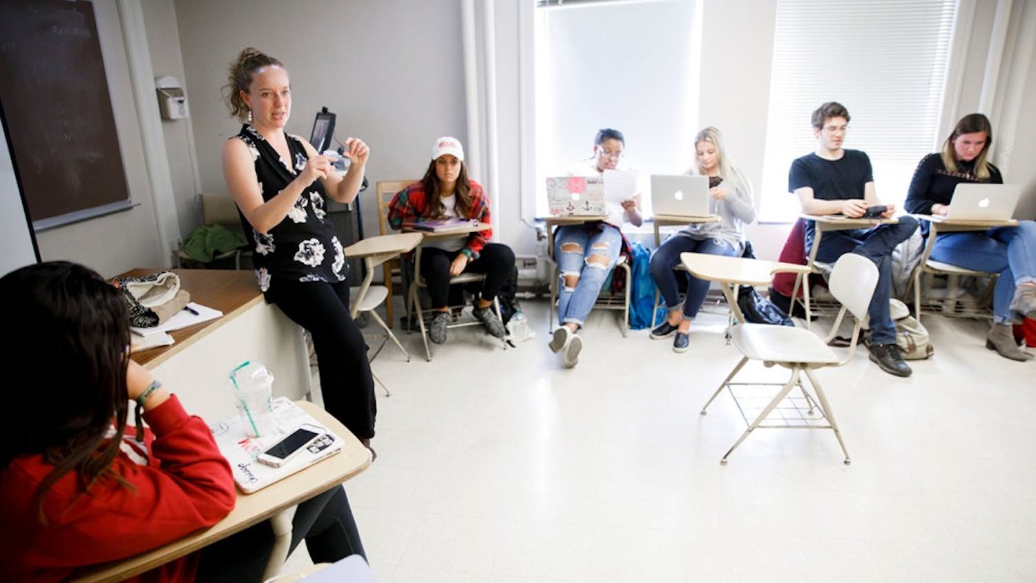 Jennie Gubner, visiting lecturer in the Department of Folklore and Ethnomusicology at IU, talks with her students during class. Her service learning course pairs students with older adults who have Alzheimer's and uses music to try and help them.