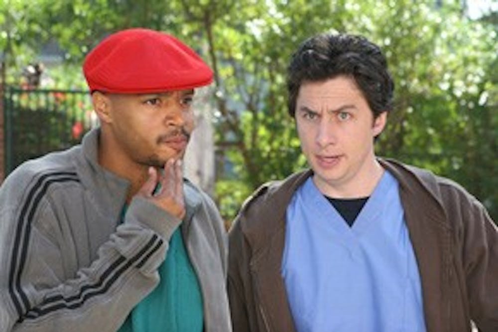 SCRUBS -- NBC Series -- "My Big Bird" -- Pictured: (l-r) Zach Braff as John "J.D." Dorian, Donald Faison as Chris Turk -- NBC Entertainment Photo: Michael DesmondFOR EDITORIAL USE ONLY / DO NOT ARCHIVE / NOT FOR RESALE