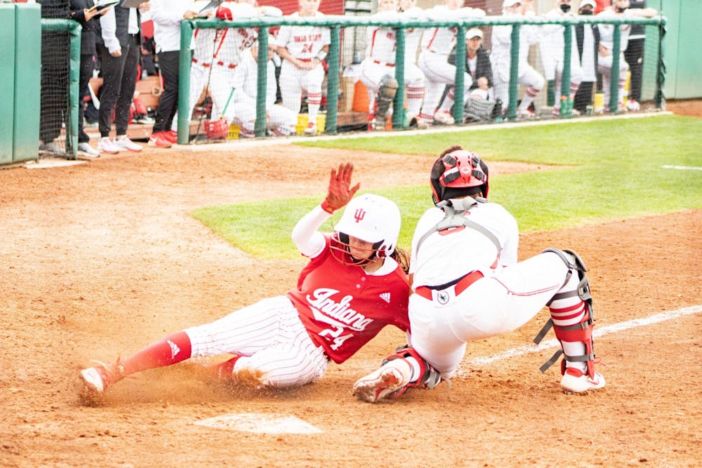 <p>Senior Infielder Grayson Radcliffe slides home against Ohio State on April 16. IU softball swept Penn State this past weekend and finished the season in fifth place in the Big Ten.</p>