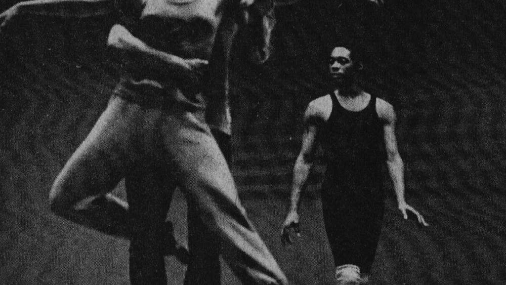 UNDER THE WATCHFUL eye of master-performer Victor Upshaw, student dancers weave a "Jazz Concerto" as part of tonight's "Evening of Ballet" produced by the IU Ballet Theatre. Upshaw, a professional dancer, not only staged the ballet but will perform a featured role.