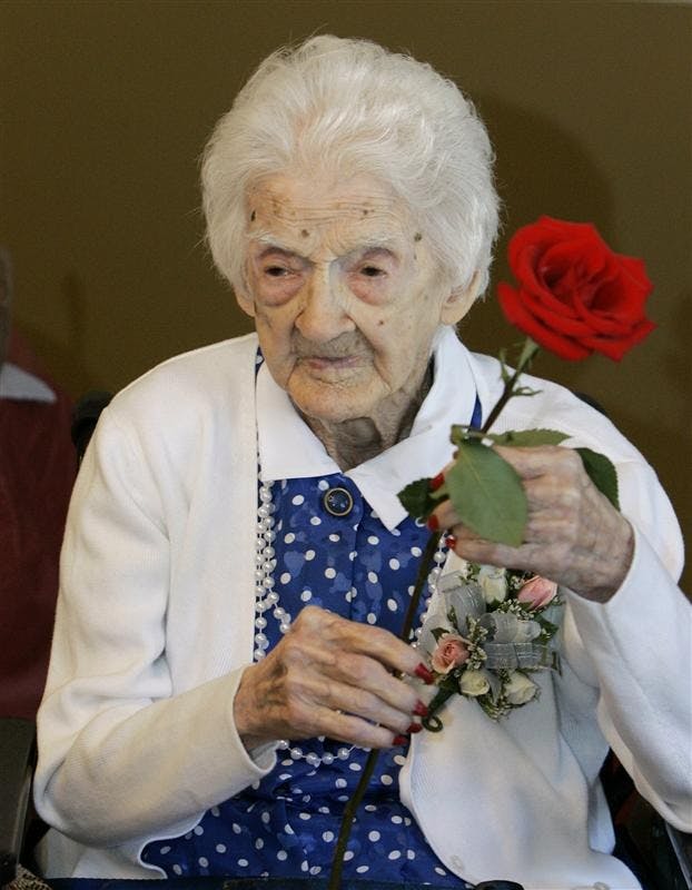 Edna Parker holds a rose that she was given during a birthday party for her in Shelbyville, Ind., in this Friday, April 18, 2008 file photo. Parker passed away Wednesday Nov. 26, 2008 at a nursing home in Shelbyville, Ind., UCLA gerontologist Dr. Stephen Coles said. Parker was born April 20, 1893 and was 115 years, 120 days old. 