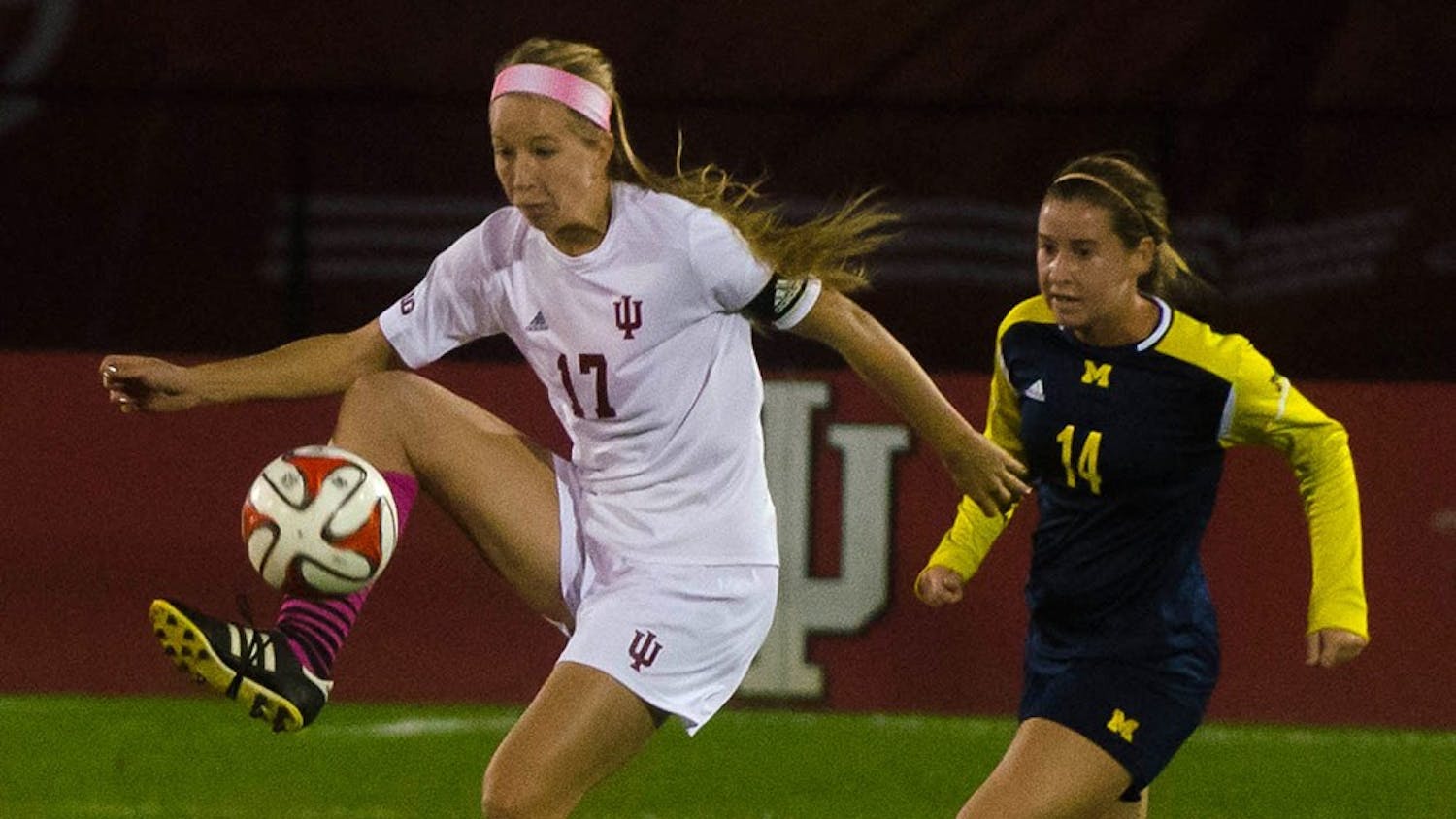 Senior midfielder Jordan Woolums intercepts a pass during IU's game against Michigan on Oct. 11 at Bill Armstrong Stadium. The wolverines defeated IU 3-0.