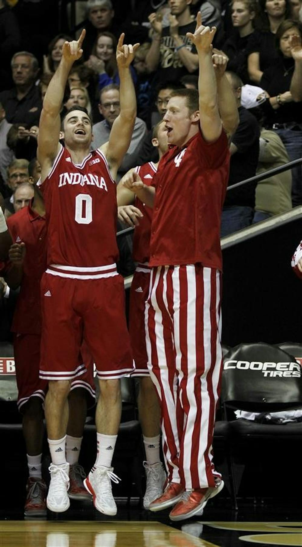 ThenjJunior forwards Jeff Howard and Will Sheehey dance before the second half Jan. 30 in the game against Purdue at Mackey Arena. IU won 97-60.