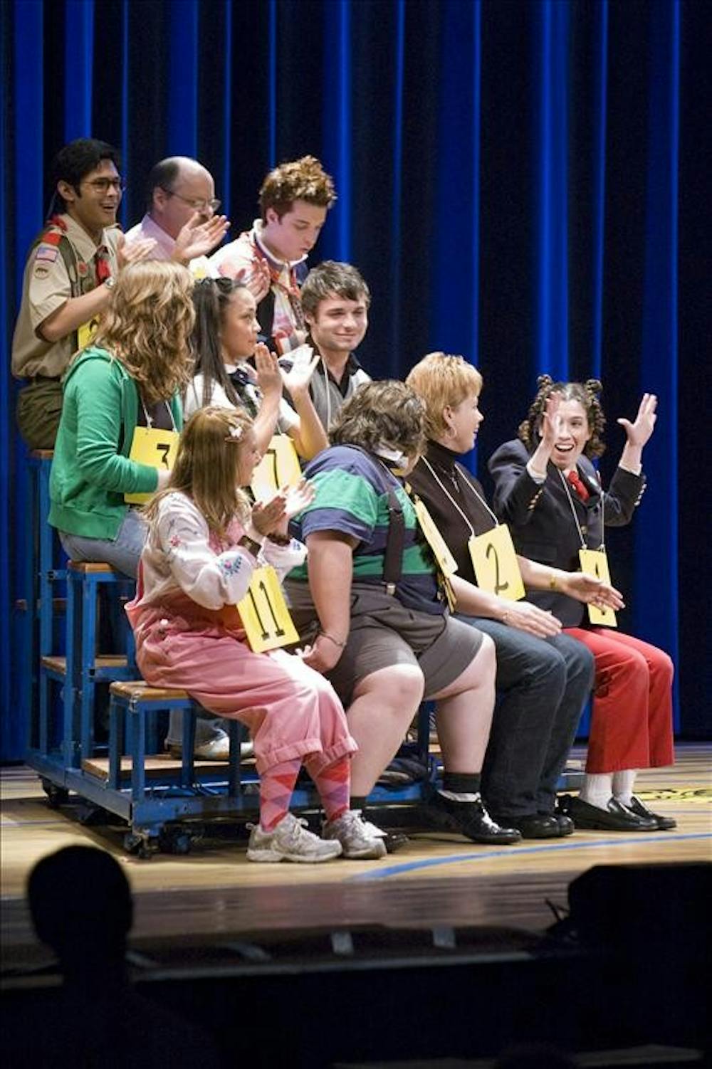 Spelling bee participants applaud the commencement of the spelling bee on Wednesday evening at IU Auditorium. This one-act Broadway musical is a Tony-Awward winning performance. 