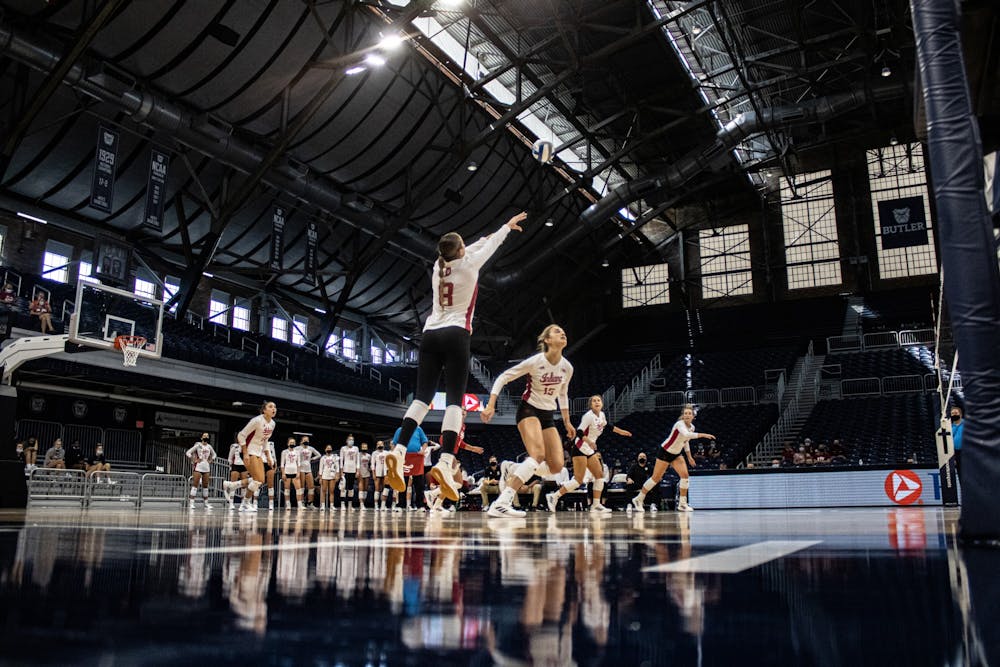 <p>Graduate student Brooke Westbeld sets up a play to return the ball during IU volleyball’s game against Bowling Green State University on Aug. 29, 2021, at Hinkle Fieldhouse in Indianapolis. IU went undefeated at the Top Dawg Challenge tournament this weekend.</p>