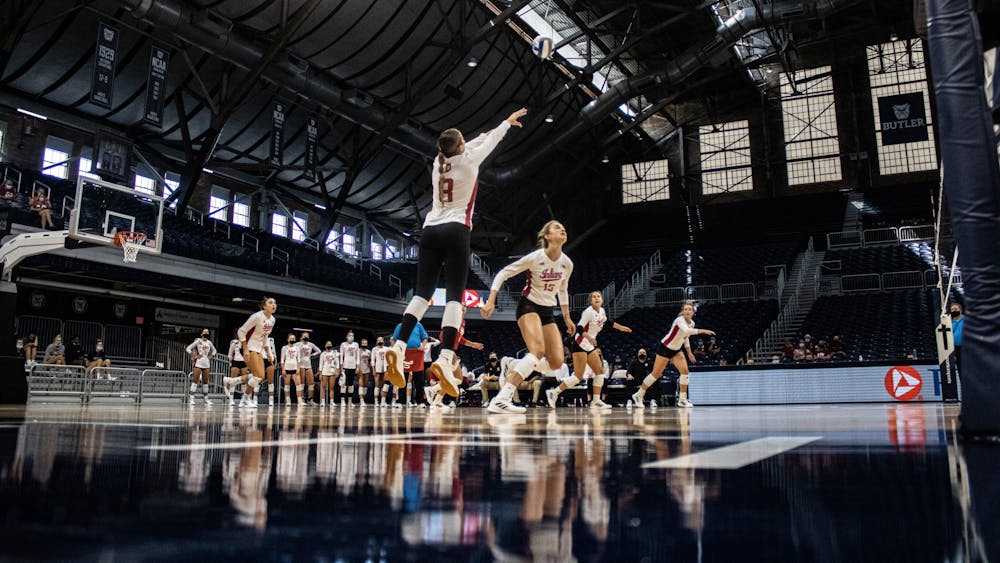 Graduate student Brooke Westbeld sets up a play to return the ball during IU volleyball’s game against Bowling Green State University on Aug. 29, 2021, at Hinkle Fieldhouse in Indianapolis. IU went undefeated at the Top Dawg Challenge tournament this weekend.