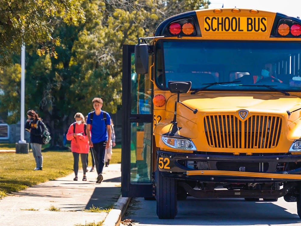 Students board busses at Bloomington High School South on Sept. 13, 2021. Monroe County residents elected new school board members in both of the county’s school corporations Tuesday.  