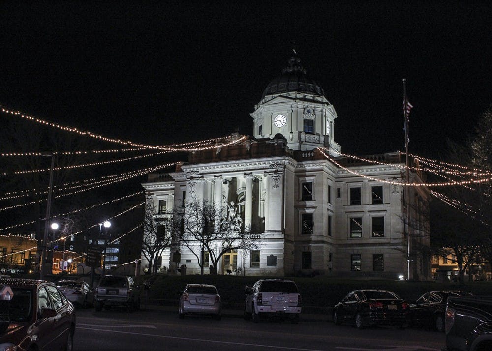 <p>The square in downtown Bloomington is lit up with lights for the holiday season. The lights are hung from the top of the capital building onto the tops of the stores surrounding the square.&nbsp;</p>