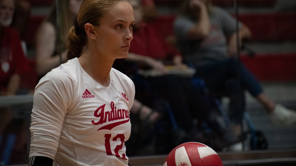 Senior outside hitter Grae Gosnell prepares to serve August 25, 2023, at Wilkinson Hall against New Hampshire in Bloomington. Indiana will travel to Miami to play in the 305 Challenge.