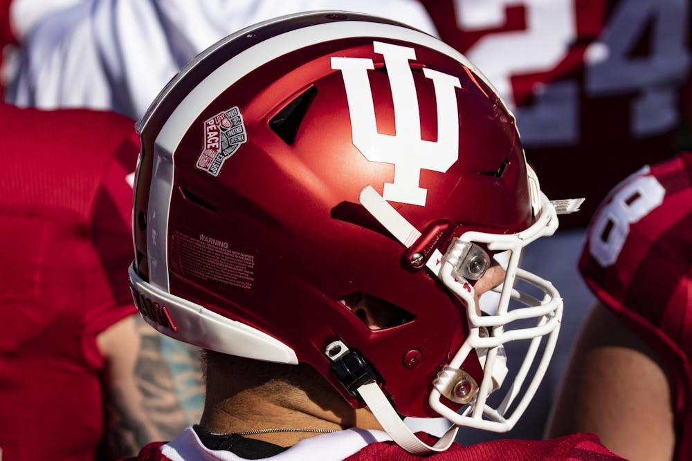 <p>A Hoosier football player wears an IU helmet Oct. 24, 2020, in Memorial Stadium. The University of Cincinnati defeated Indiana 45-24 on Saturday.</p>