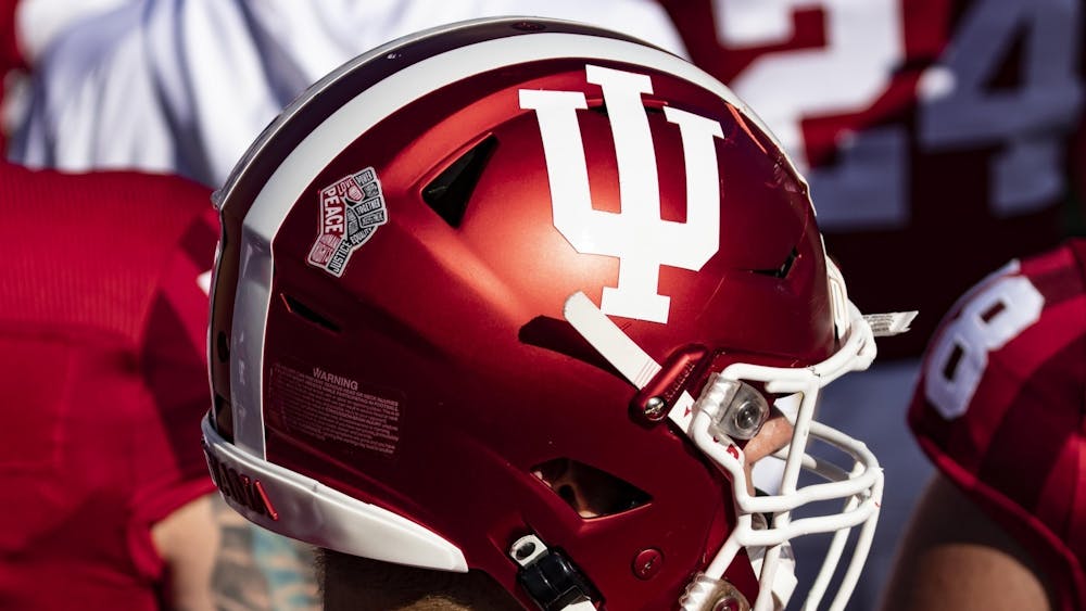 A Hoosier football player wears an IU helmet Oct. 24, 2020, in Memorial Stadium. The University of Cincinnati defeated Indiana 45-24 on Saturday.