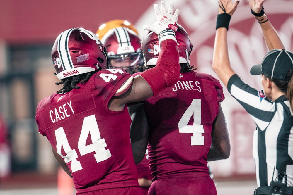<p>Senior linebackers Cam Jones and Aaron Casey celebrate a safety Sept. 10, 2022, at Memorial Stadium. Jones is predicted to be a key player for the rest of the Hoosiers&#x27; season.</p>