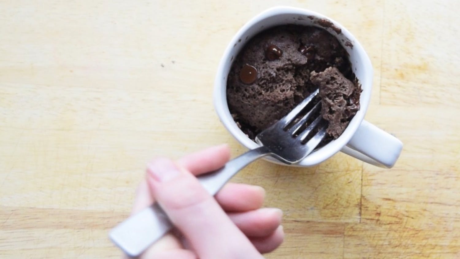 Chocolate cake in a mug is an easy way to fulfill any chocolate cravings. It only needs four ingredients and can be prepared in your residence hall.