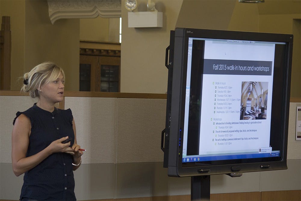 Emma McDonell, Grant Consultant at the Grad Grants Center, speaks with graduate students during a resource fair put on by the center and the Social Science Research Commons. McDonell was one of multiple speakers who gave students information about planning for grants and how to take advantage of the resources provided to graduate students on campus.