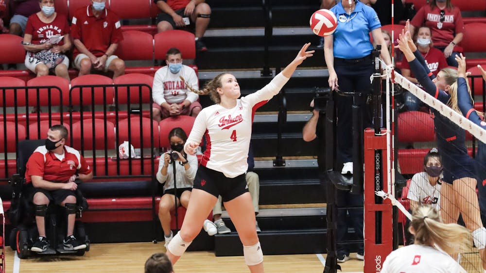 Freshman outside hitter Mady Saris tips the ball Sept. 17, 2021, in Wilkinson Hall. Indiana is 2-6 in the Big Ten after losing twice this week.