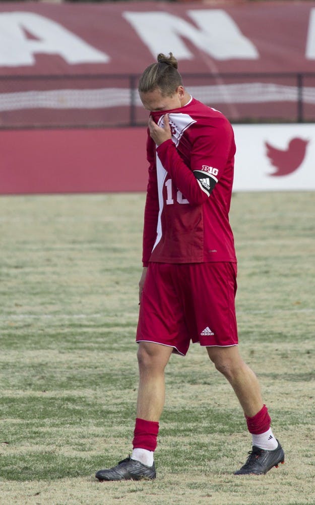 An emotional Richard Ballard walks off the field after Sunday afternoon's overtime NCAA Tournament loss against Virginia Tech at Bill Armstrong Stadium.