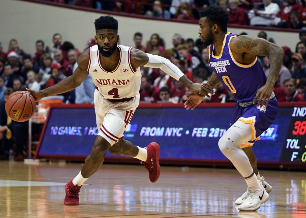 Senior guard Robert Johnson dribbles the ball against Tennessee Tech on Dec. 21 in Simon Skjodt Assembly Hall. Johnson led IU in scoring during Saturday's win at Minnesota.&nbsp;