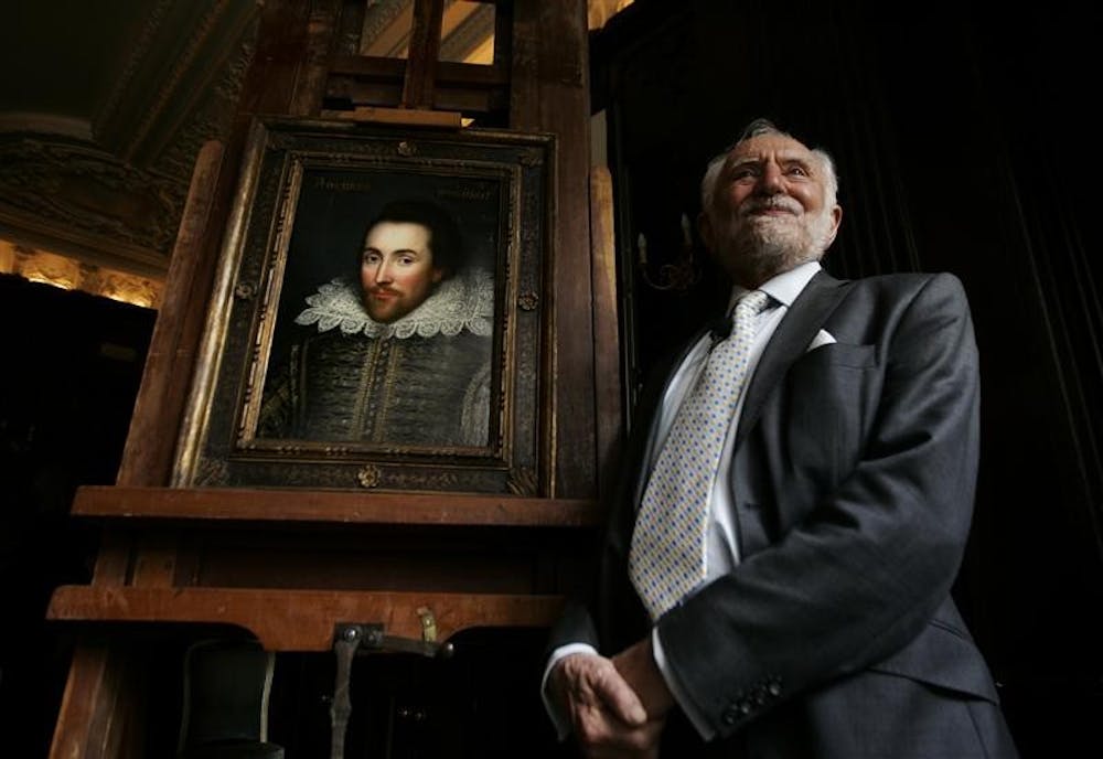 Professor Stanley Wells, chairman of the Shakespeare Birthplace trust and one of the world's leading experts on Shakespeare studies according to the trust, poses next to a newly discovered portrait of William Shakespeare, in central London, Monday. The portrait, believed to be almost the only authentic image of the writer made from life, has belonged to one family for centuries but was not recognized as a portrait of Shakespeare until recently. There are very few likenesses of Shakespeare, who died in 1616.