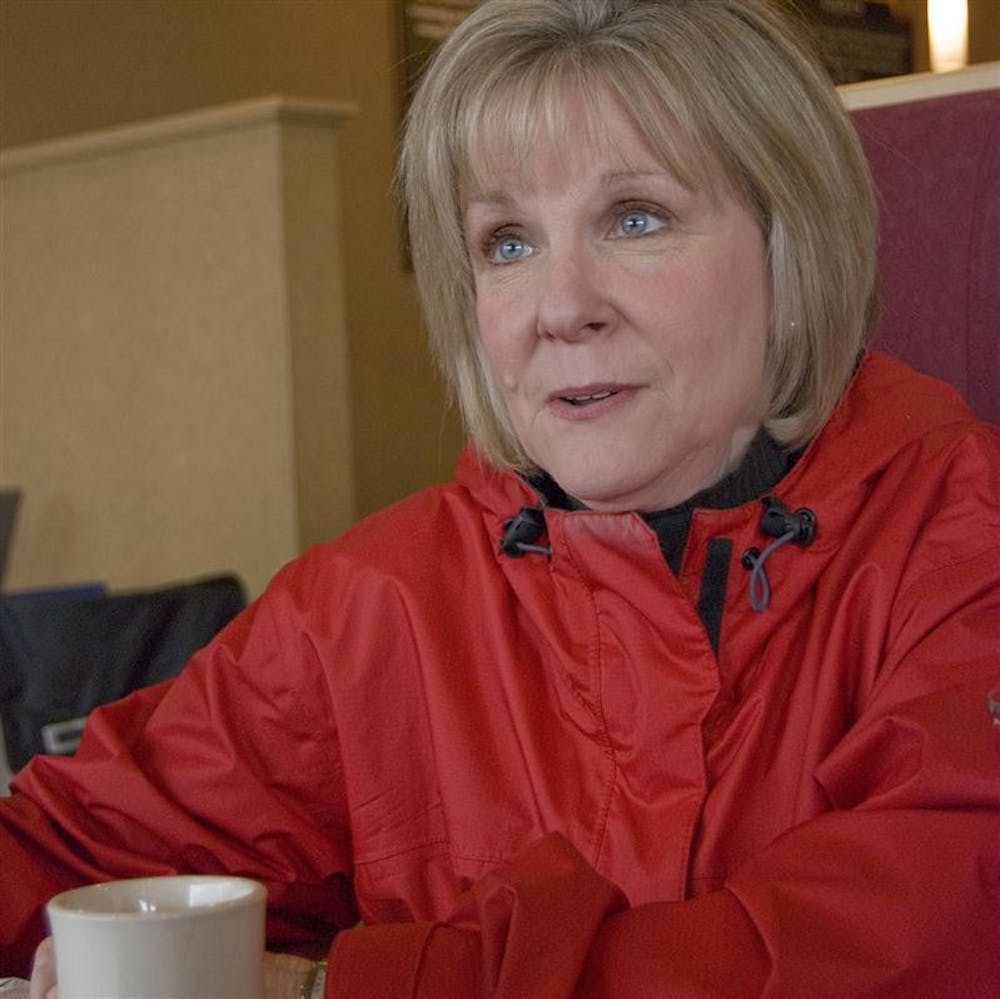 Jane Hoeppner enjoys coffee April 13th at the Scholars Inn Bakehouse on Third Street. Since the death of her husband, the late IU football coach Terry Hoeppner, Jane has started the Coach Hep Cancer Challenge and is active in the North End Zone Project.