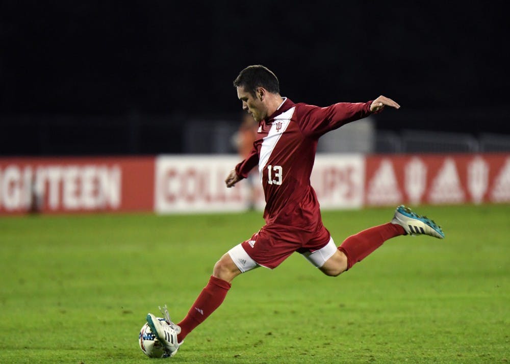 Junior midfielder Francesco Moore kicks the ball against Kentucky on Oct. 11 at Bill Armstrong Stadium. IU can clinch a spot in the Big Ten Tournament Championship Game with a win against Ohio State this Friday.&nbsp;