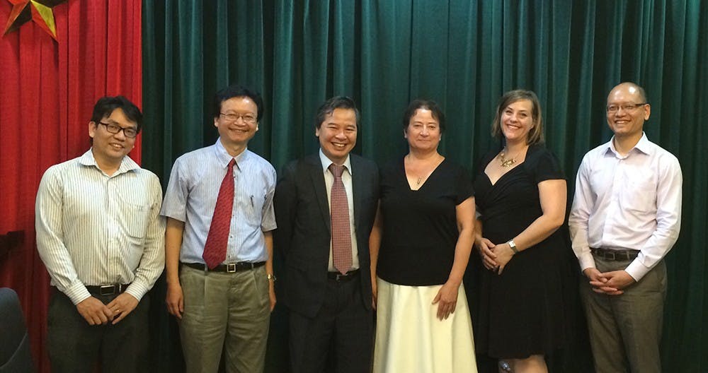Indiana University representatives meet with officials from Vietnam National University in Hanoi. Pictured, from left, are Nguyen Tran Tien, dean of Oriental studies; Nguyen Thien Nam, dean of Vietnamese studies; Pham Quang Minh, vice rector; Lauren Robel, IU provost and executive vice president; Catherine Dyar, chief of staff to the provost; and Anh Tran, director of Vietnam Initiatives in the IU School of Public and Environmental Affairs.
