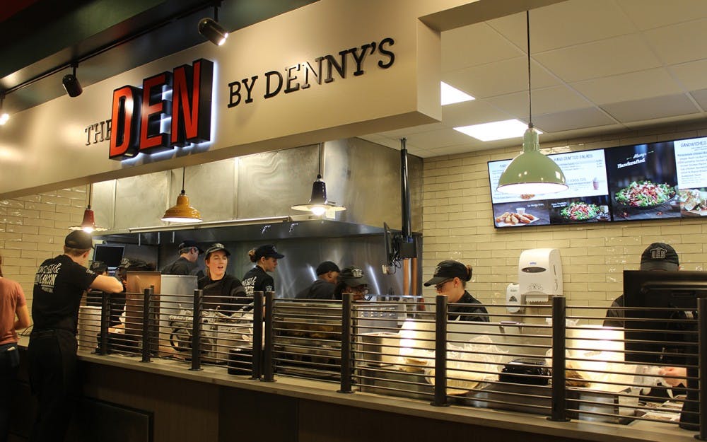 Student workers learn about how the new Den by Denny's will operate during the soft-opening on Saturdy afternoon in Gresham foodcourt. Den by Denny's officially opens on Tuesday and used the weekend to find out what problems could come up during busy serving times and how to fix them/