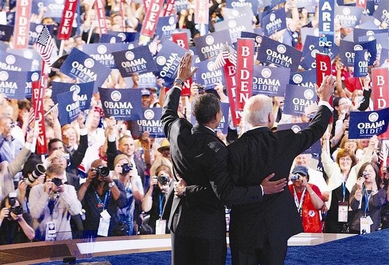 Sen. Barack Obama, D-Ill., and  Democratic vice presidential candidate, Sen. Joe Biden, D-Del., wave at the crowd Wednesday at the Democratic National Convention in Denver.  