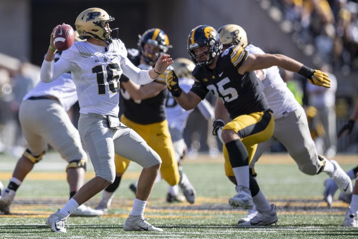 Purdue quarterback Aidan O'Connell throws the football during Purdue's Saturday upset of then-No. 2 Iowa. O'Connell finished with 30 for 40 passing for 387 yards and two passing touchdowns.