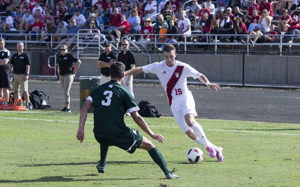 Sophomore defender Andrew Gutman crosses a player in Sunday afternoon's 2-1 victory over Michigan State at Bill Armstrong Stadium.