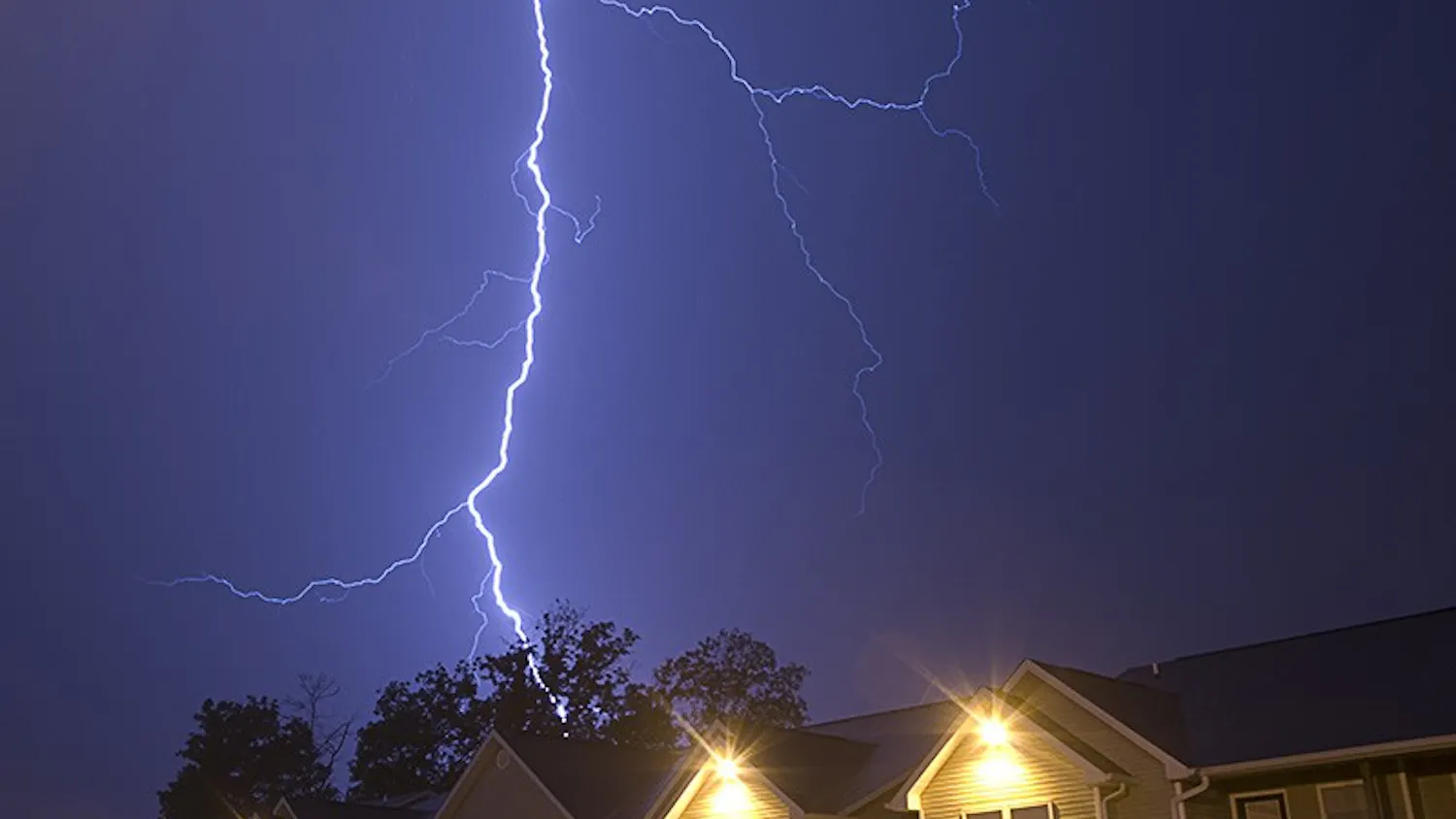 Brandon Foltz / IDS
Lightning strikes during severe weather Friday night over Bloom Apartments on South Adams Street. Several more storms passed through the area Friday night adding to rainfall that caused Wednesday's flooding.
