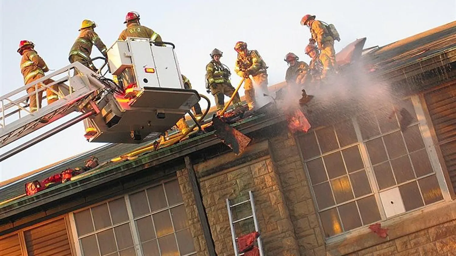 Firefighters battle a blaze atop the Ora L. Wildermuth Intramural Center on Dec. 31 at the School of Health, Physical Education, and Recreation building.