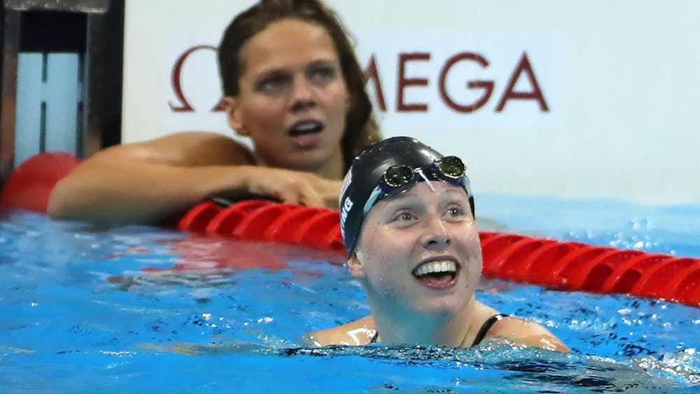 IU sophomore Lilly King reacts to her time in the 100-meter breaststroke, beating Russian swimmer Yuia Efimova, in back, to win a gold medal on Aug. 8 at the 2016 Olympic Games.