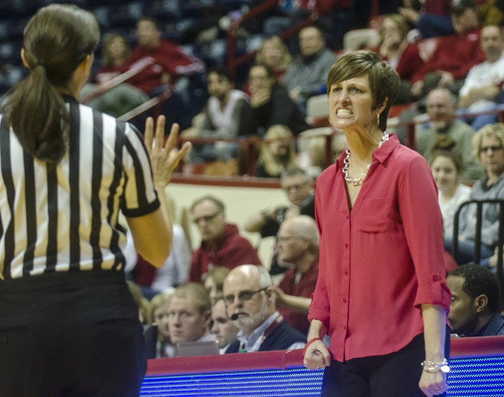 Head Coach Teri Moren aruges with a referee at Assembly Hall during the Hoosier's final home game of the season against Nebraska on Saturday. IU lost 67-64.
