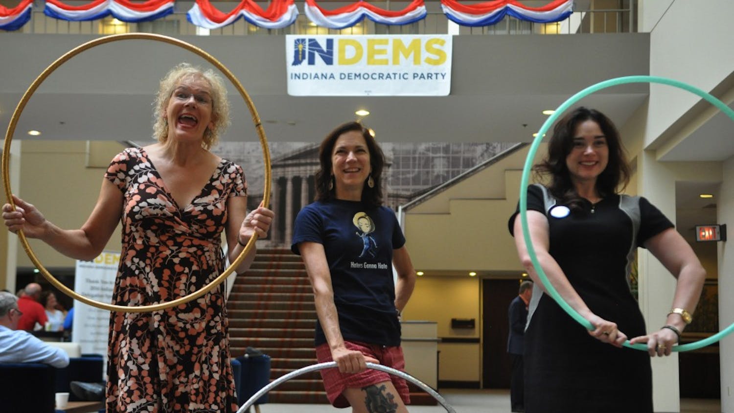 Three Indiana District 9 delegates practice with their hula hoops in the lobby of their hotel the week of the Democratic National Convention.