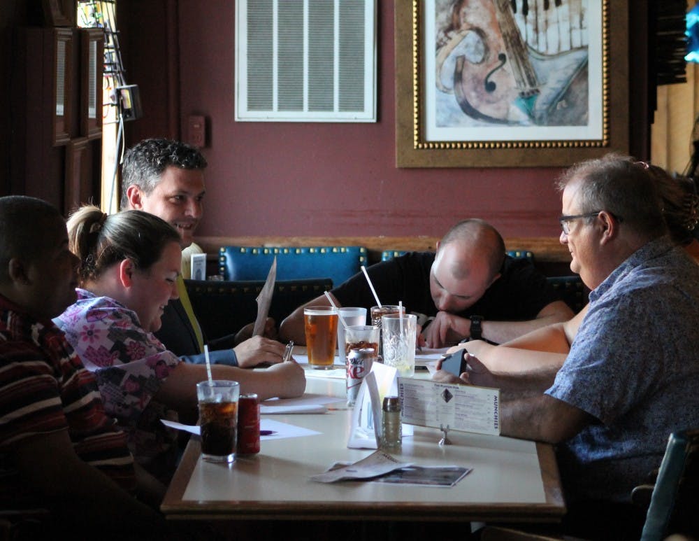 Patrons gather at Players Pub for drinks and trivia. Players Pub holds trivia night every Monday and Tuesday at 6:30.