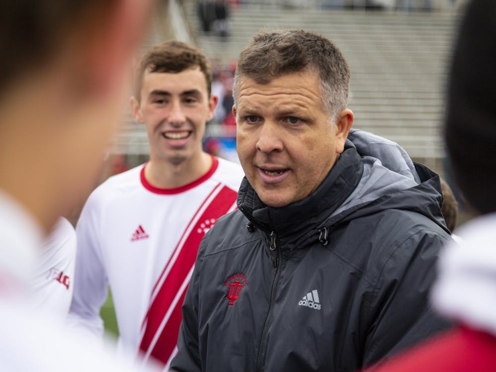 IU men&#x27;s soccer head coach Todd Yeagley talks to his team after IU defeated the University of Connecticut in the second round of the NCAA Tournament on Nov. 18, 2018, at Bill Armstrong Stadium. Yeagley has adopted personal at-home workouts, daily video chats and Kahoot! quizzes as part of his athletes&#x27; new training program during the COVID-19 pandemic.