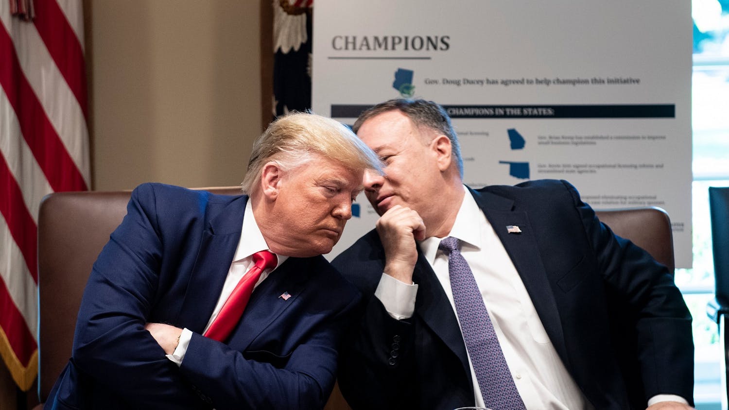 President Donald Trump listens to U.S. Secretary of State Mike Pompeo during a Cabinet Meeting on Oct. 2 in Washington, D.C. 