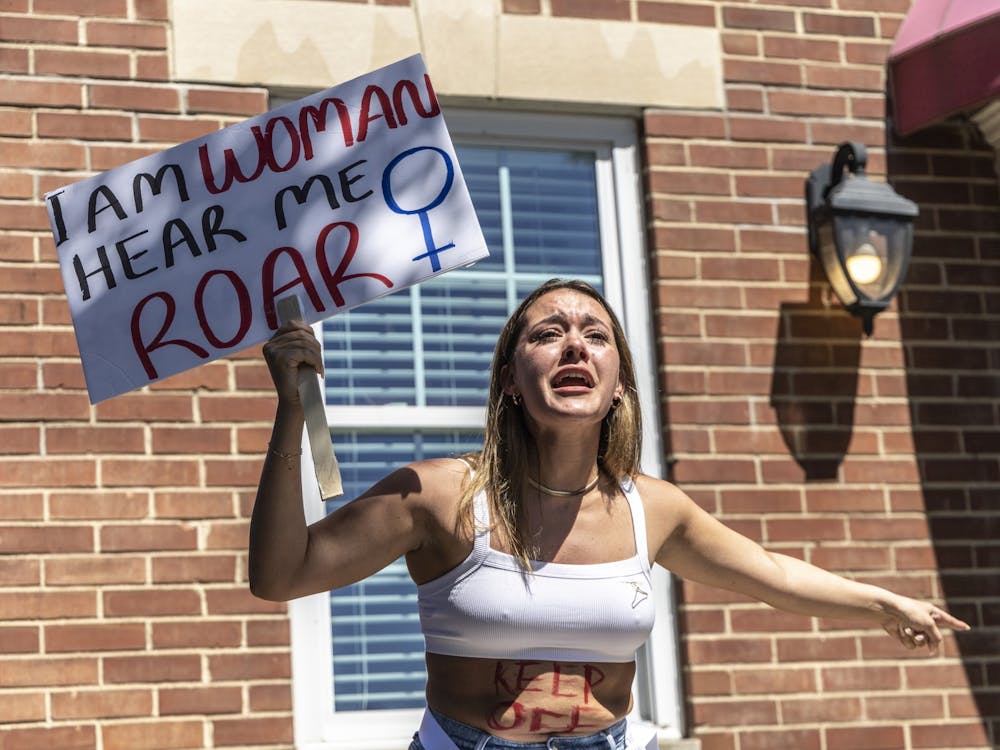 A protestor shares her reasons for supporting access to abortion in front of Women’s Care Center on June 27, 2022, on College Avenue. Throughout March, IU Bloomington will host several events to celebrate Women’s History Month.