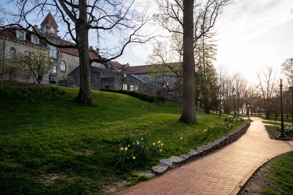 <p>An empty path is pictured April 8 by the Frances Morgan Swain Student Building. An IU student filed a lawsuit Wednesday seeking reimbursement for tuition and fees after the university moved classes online due to the coronavirus pandemic.&nbsp;</p>