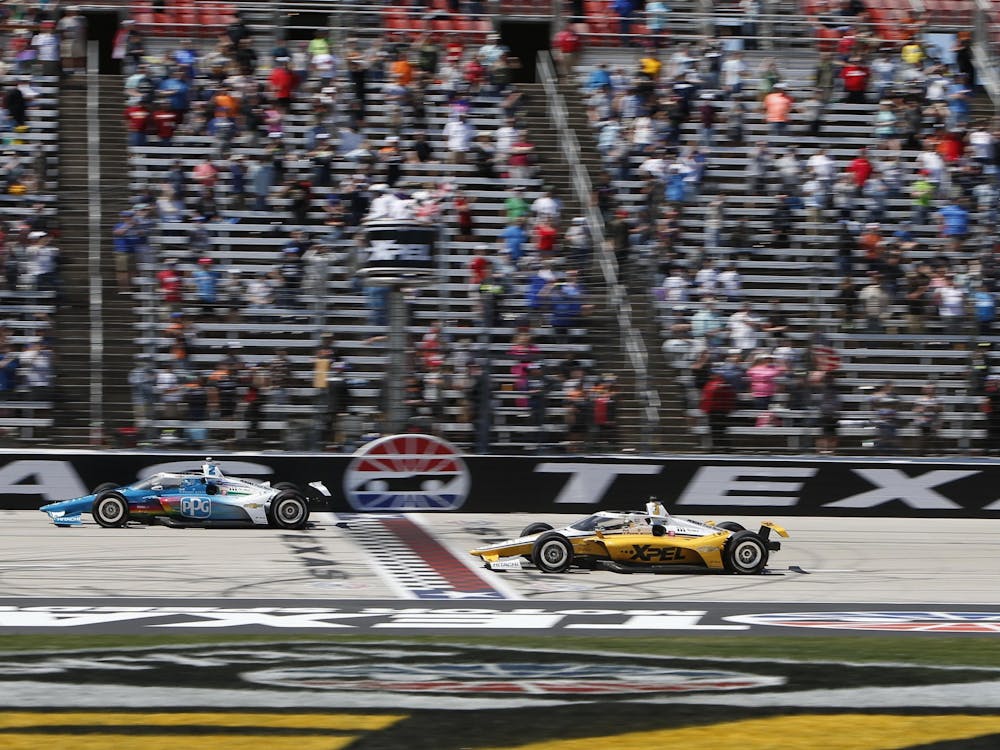 Josef Newgarden beats Team Penske teammate Scott McLaughlin to the finish line on the last lap of the XPEL 375 on March 20, 2022, at the Texas Motor Speedway in Fort Worth, Texas. Newgarden won his second race of the season at the Grand Prix of Long Beach on Sunday.
