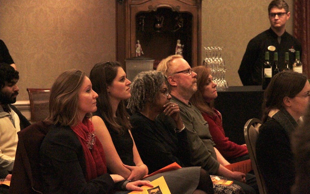 Audience attend Rowe’s talk on the virtual global theaters Monday.