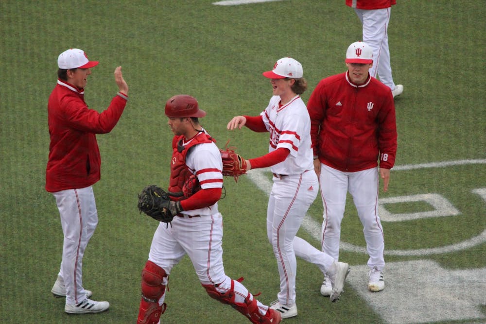 <p>Junior pitcher Nathan Stahl celebrates with his teammates after pitching three innings during Indiana’s win over the University of Cincinnati on Tuesday at Bart Kaufman Field. Indiana will face Purdue University Fort Wayne in the second game of its two-game home stand at 4 p.m. Wednesday.</p>