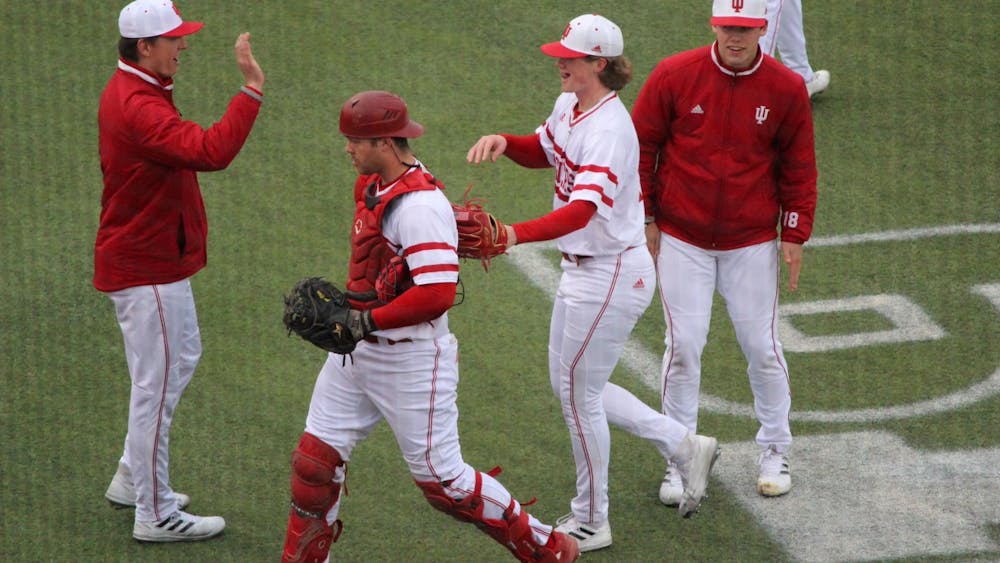 Junior pitcher Nathan Stahl celebrates with his teammates after pitching three innings during Indiana’s win over the University of Cincinnati on Tuesday at Bart Kaufman Field. Indiana will face Purdue University Fort Wayne in the second game of its two-game home stand at 4 p.m. Wednesday.