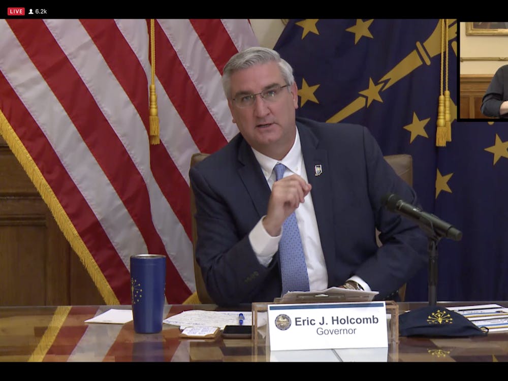 Gov. Eric Holcomb speaks July 22 during a press conference. He announced not wearing a mask will be a misdemeanor after the statewide mask mandate goes into effect Monday.