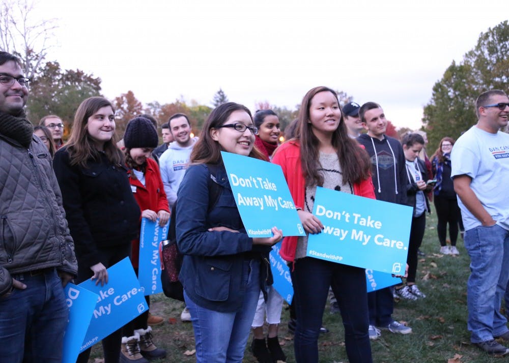 IU Democrats at IU participate in the Reproductive Rights Rally Wednesday evening. Participants rallied in Dunn Meadow to listen to speeches about reproductive rights.