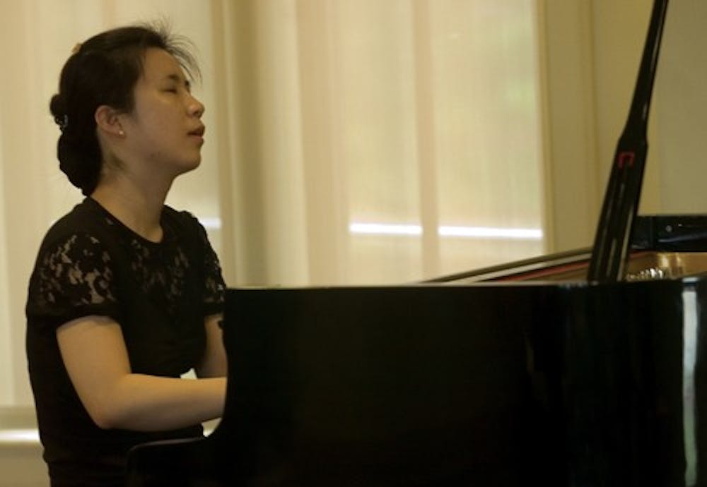 Graduate student Hye-Won Jo performs for audience members, March 30 at the International Center. The concert was a part of the International Center’s Friday Noon Concert Series.