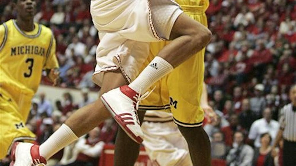 Freshman guard Verdell Jones goes for a baket as Michigan's DeShawn Sims attempts a block Wednesday at Assembly Hall. The Hoosiers face Illinois on the road this Saturday.