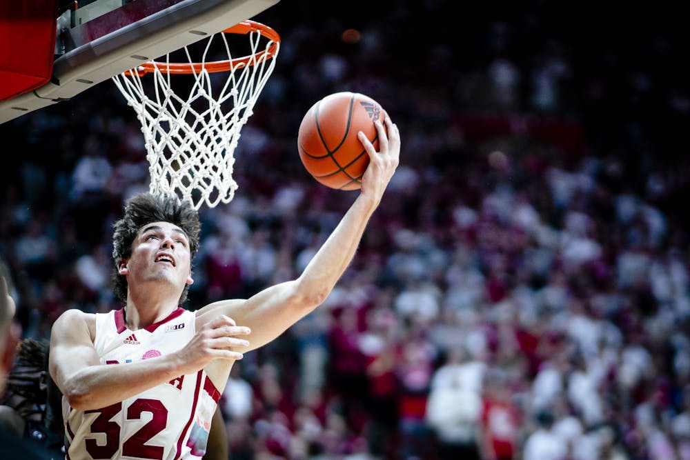 <p>Junior guard Trey Galloway lays in a shot Feb. 7, 2023, at Simon Skjodt Assembly Hall in Bloomington. The Hoosiers face the Wolverines Saturday at 6 p.m.</p>
