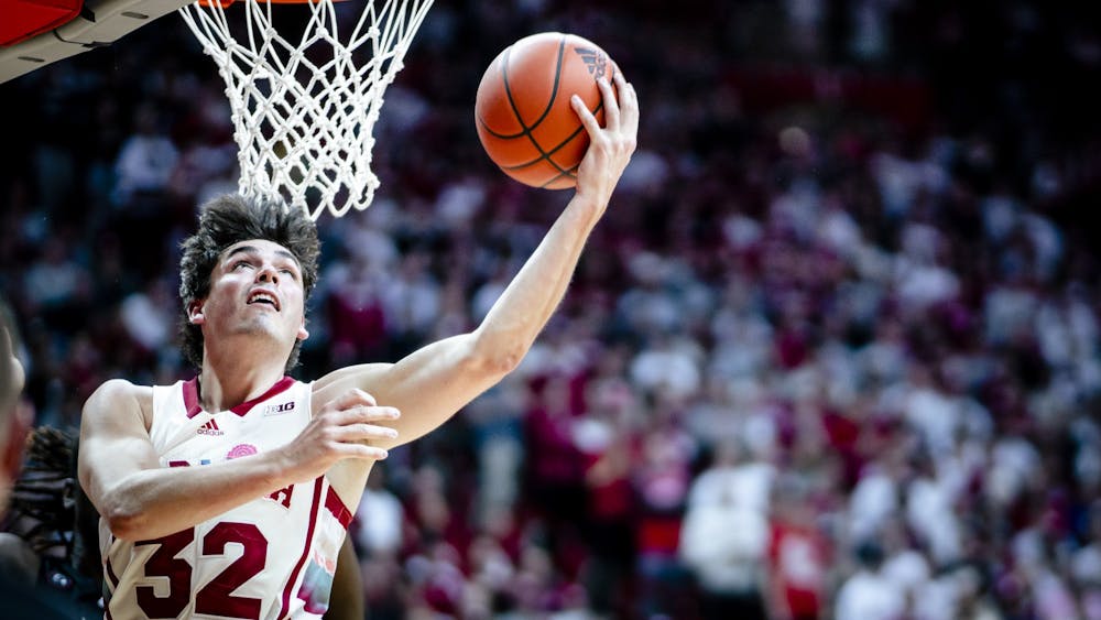 Junior guard Trey Galloway lays in a shot Feb. 7, 2023, at Simon Skjodt Assembly Hall in Bloomington. The Hoosiers face the Wolverines Saturday at 6 p.m.